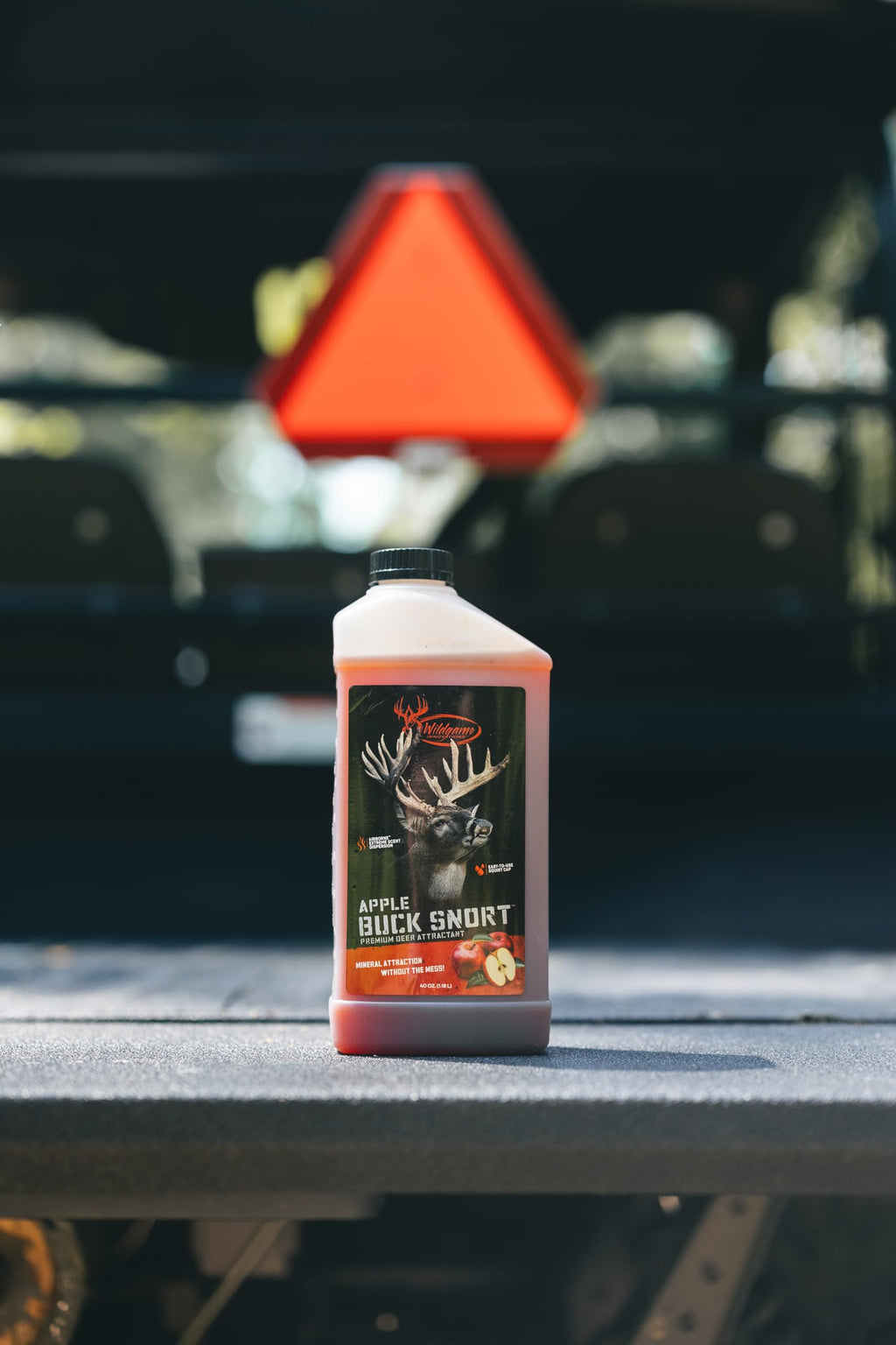 Wildgame Innovations Buck Snort Apple Concentrated Deer Attractant, 40 Oz Effective Year-Round Long-Lasting Liquid Mineral With