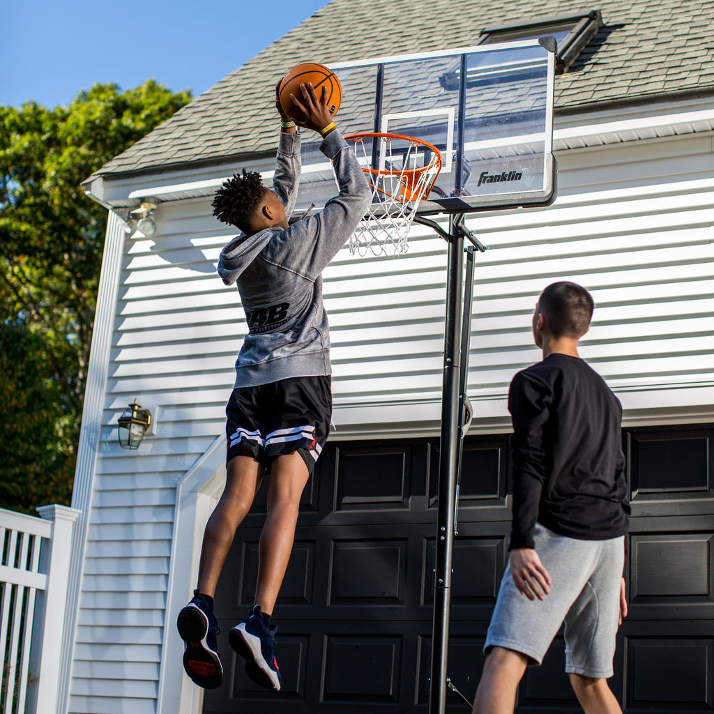 Franklin Sports Portable Basketball Hoop - 48'' Adjustable Outdoor Basketball Hoop With Wheels - Authentic Driveway Basketball H