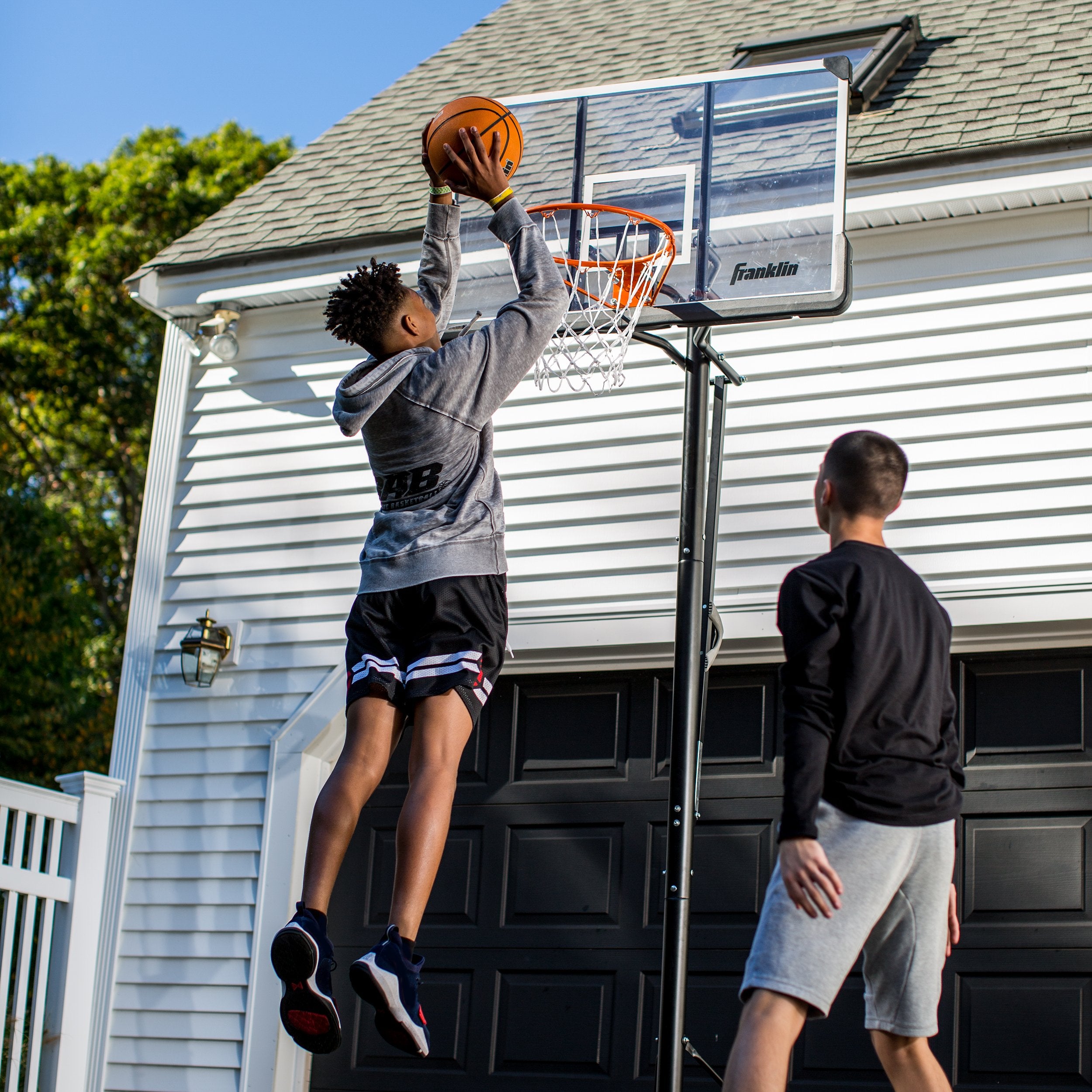 Franklin Sports Portable Basketball Hoop - 48'' Adjustable Outdoor Basketball Hoop With Wheels - Authentic Driveway Basketball H