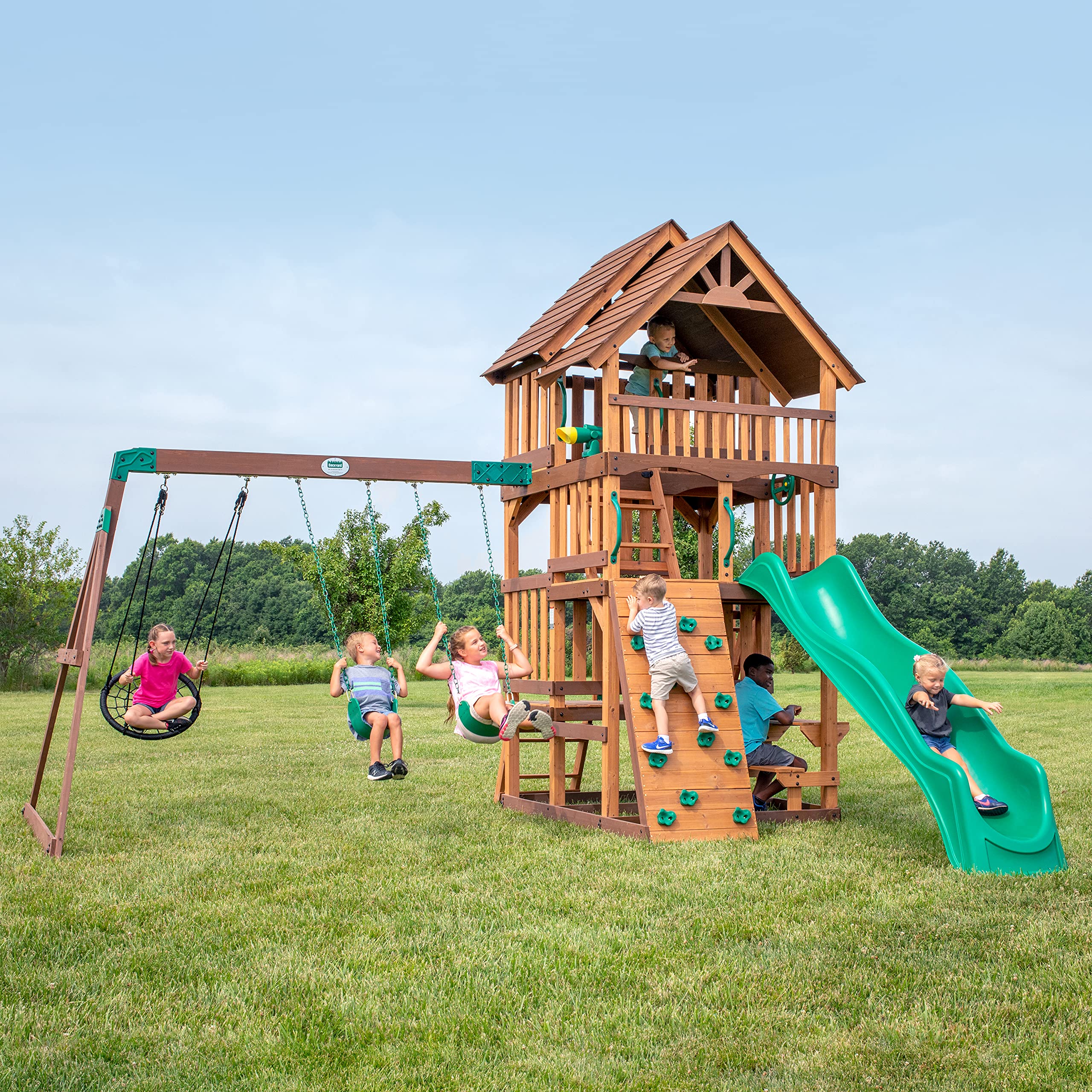 Backyard Discovery Highlander Cedar Wood Swing Set with Wave Slide, Three-Story Clubhouse, Rock Wall, Picnic Table, Belt Swings,