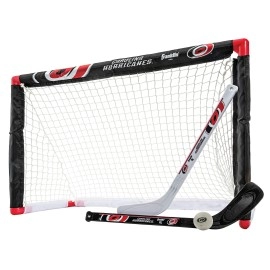 Franklin Sports Carolina Hurricanes Mini Hockey Set - Knee Hockey Goal, Ball, & 2 Hockey Stick Combo Set - Mini Goal Net - NHL Official Hockey Set